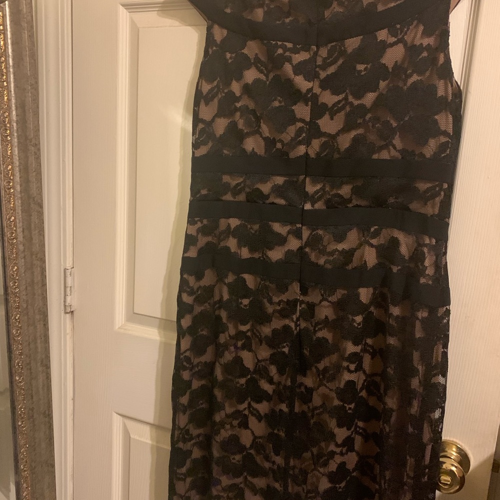 Connected apparel dress. Black lace